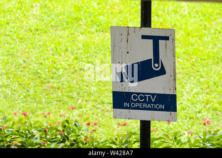 Mucky CCTV sign Singapore Stock Photo