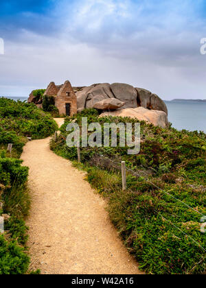 Ploumanach.The old powder house, pink granite coast, Perros Guirec, Cotes d'Armor, France Stock Photo