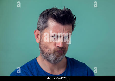 People and emotions - angry man with beard isolated Stock Photo