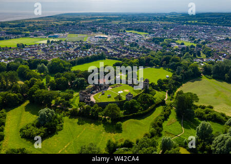 Aerial drone view of the ruins of ancient Caldicot Castle in South Wales, UK Stock Photo