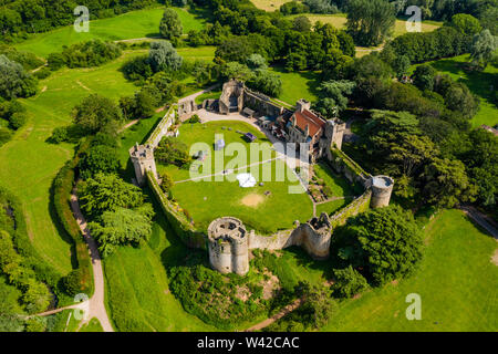 Aerial drone view of the ruins of ancient Caldicot Castle in South Wales, UK Stock Photo