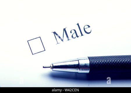 Male - checkbox with a cross on white paper. Checklist concept. Stock Photo