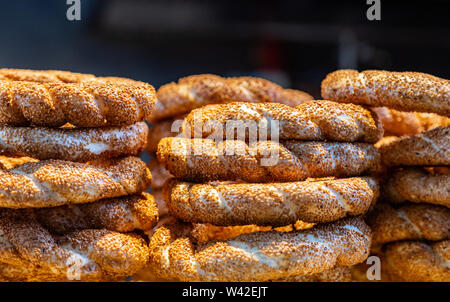 Traditional turkish simit, sesame bread ring bagels, street food closeup view Stock Photo