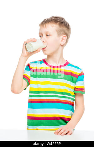 child drinks milk from a glass, portrait of a healthy boy concept photo healthy food Stock Photo
