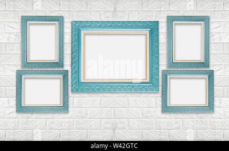 Classic blank photo frame on white modern brick wall  in showroom and gallery. Stock Photo