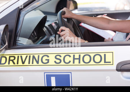 Learning to drive a car. Driving school. Driver education. Stock Photo
