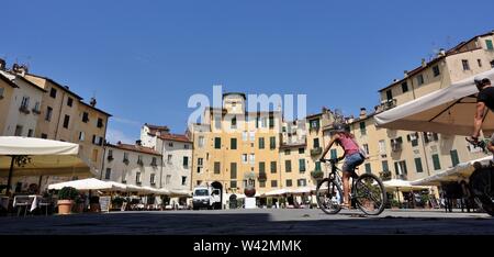 Lucca, Italy - Famous Piazza Anfiteatro in the northeast quadrant of walled center of Lucca Stock Photo