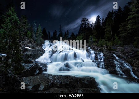 A moonlit night view looking out at Glen Alpine Falls in South Lake Tahoe, California. Stock Photo