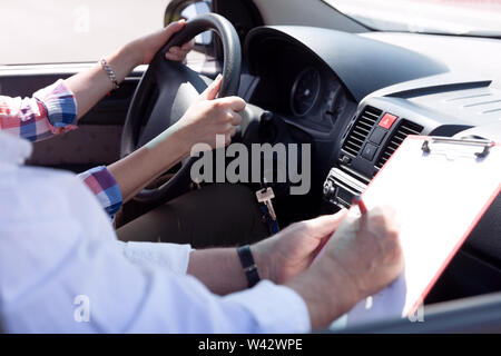 Learning to drive a car. Driving school. Driver education. Stock Photo