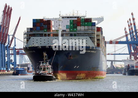 The container ship CMA CGM Zheng He leaves Hamburg harbor on May 11, 2019. Stock Photo