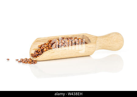 Lot of whole raw red quinoa seeds with wooden scoop isolated on white background Stock Photo
