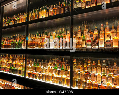 Edinburgh, Scotland - May 12, 2019:  The Diageo Claive Vidiz Collection of 3.384 bottles of whiskey, displayed at the Scotch Whisky Experience.