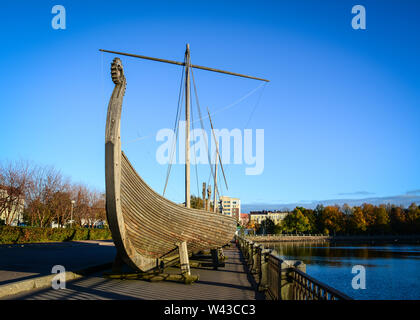 Vyborg, Russia - Oct 5, 2016. Drakkar (Viking wooden boat) on the waterfront in Vyborg, Russia. Vyborg is 174km northwest of St Petersburg and just 30 Stock Photo