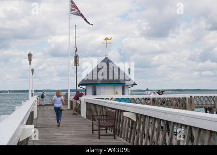 People on Yarmouth pier, Isle of Wight, England, UK Stock Photo