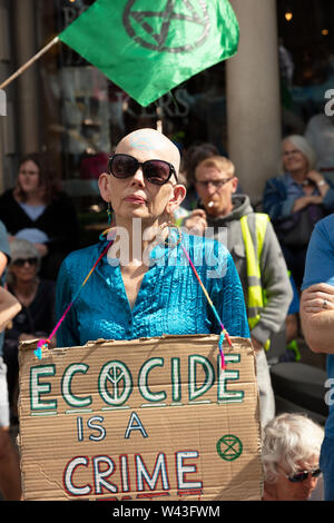 London, UK. 15th July 2019. Extinction Rebellion activist at the climate action group's protest in front of the Royal Courts of Law on the Strand, London. Credit: Joe Kuis / Alamy News Stock Photo