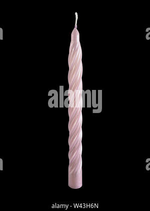 Wax Candle Isolated on Black Background. Stock Photo