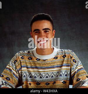 Young man looking at camera Stock Photo