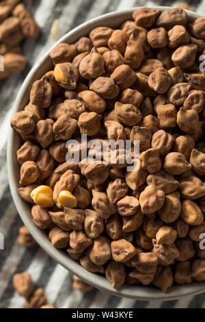 Dry Organic Kala Chana Desi Chickpeas in a Bowl Stock Photo