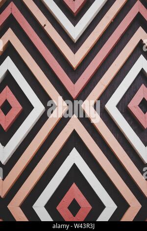 Beautiful vertical shot of pink, black and white textured patterned wall - perfect wallpaper Stock Photo
