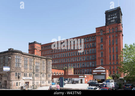 The grade II listed East Mill building and former office building, Strutt House, in Belper, Derbyshire, England, UK Stock Photo