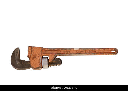 Old metal adjustable pipe wrench horizontal and isolated on white background. Stock Photo