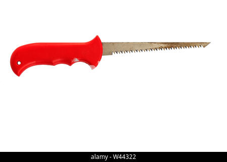 Manual narrow old saw for wood and pruning with a sharp end and a red plastic handle isolated on a white background. Stock Photo