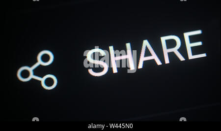 Share icon on computer display Stock Photo