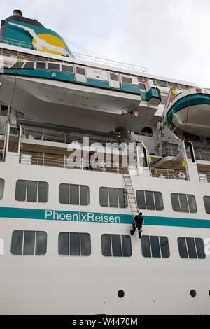 MS Amadea crew painting the side of the ship, Stavanger,Norway Stock Photo