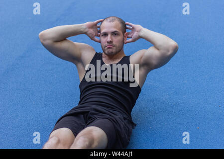 athlete man doing press exercise fitness  training workout sport Stock Photo