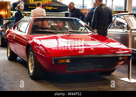 FRIEDRICHSHAFEN - MAY 2019: red FERRARI DINO 208 GT4 1977 coupe at Motorworld Classics Bodensee on May 11, 2019 in Friedrichshafen, Germany. Stock Photo