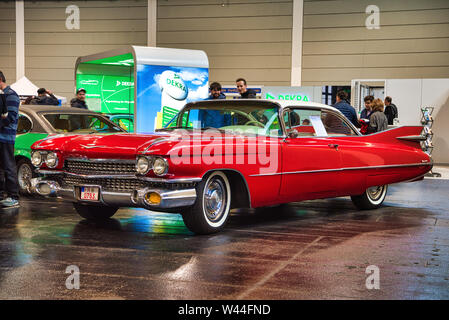 FRIEDRICHSHAFEN - MAY 2019: white red CADILLAC DE VILLE 1959 coupe at Motorworld Classics Bodensee on May 11, 2019 in Friedrichshafen, Germany. Stock Photo