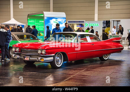 FRIEDRICHSHAFEN - MAY 2019: white red CADILLAC DE VILLE 1959 coupe at Motorworld Classics Bodensee on May 11, 2019 in Friedrichshafen, Germany. Stock Photo