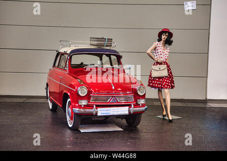 FRIEDRICHSHAFEN - MAY 2019: red LLOYD ALEXANDER 1958 and woman mannequin at Motorworld Classics Bodensee on May 11, 2019 in Friedrichshafen, Germany. Stock Photo