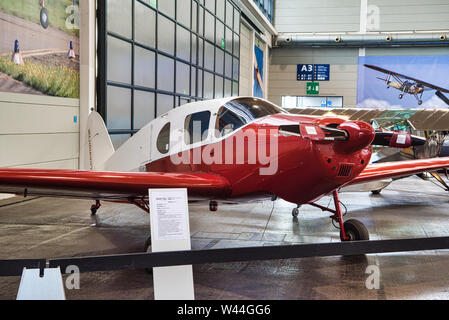 FRIEDRICHSHAFEN - MAY 2019: red plane BELLANCA CRUSAIR SENIOR 1946 at Motorworld Classics Bodensee on May 11, 2019 in Friedrichshafen, Germany. Stock Photo