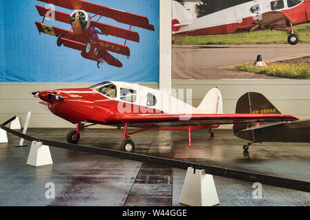 FRIEDRICHSHAFEN - MAY 2019: red plane BELLANCA CRUSAIR SENIOR 1946 at Motorworld Classics Bodensee on May 11, 2019 in Friedrichshafen, Germany. Stock Photo