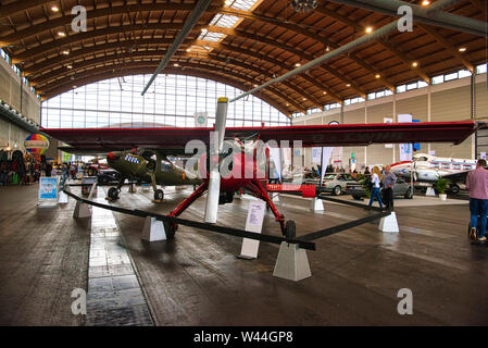 FRIEDRICHSHAFEN - MAY 2019: red plane PZL-104 WILGA 35 1976 at Motorworld Classics Bodensee on May 11, 2019 in Friedrichshafen, Germany. Stock Photo