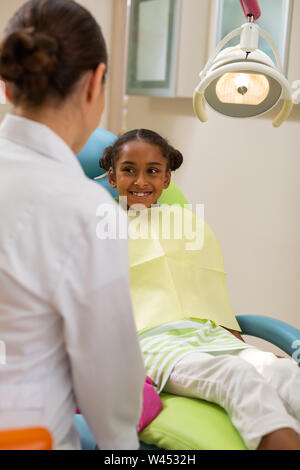 Woman doctor talking to a young female patient Stock Photo