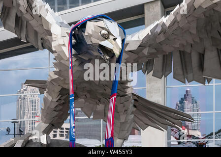 A giant stainless steel falcon is rising up in front of Mercedes-Benz  Stadium - Atlanta Magazine