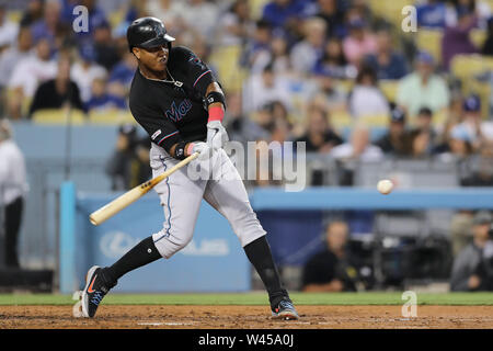 Los Angeles, CA, USA. 19th July, 2019. Miami Marlins second baseman Starlin Castro (13) makes contact at the plate during the game between the Miami Marlins and the Los Angeles Dodgers at Dodger Stadium in Los Angeles, CA. (Photo by Peter Joneleit) Credit: csm/Alamy Live News Stock Photo