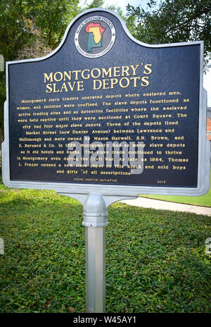 An historical marker notes the site of depots used for confinement of slaves until they were auctioned off at the nearby Square in Montgomery, AL, USA Stock Photo