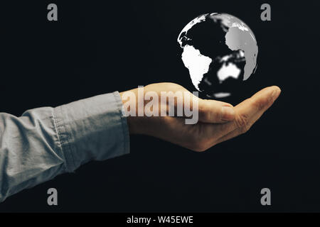 Protect our world in human hands and nebula dust. Mixed media. Stock Photo