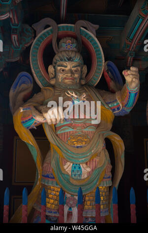 Heavenly king at the entrance gate of Bulguk Buddhist temple, Seoul, South Korea. Stock Photo