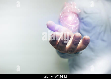 Human forefinger touches red heart innovative technologies on a white background. Mixed media. Stock Photo