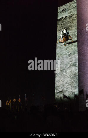Washington DC, USA. 19th July 2019. The Eagle has landed: video recreating Apollo 11's moon landing is projected onto the east face of the Washington Monument. Credit: Tim Thulson/Alamy Live News. Stock Photo