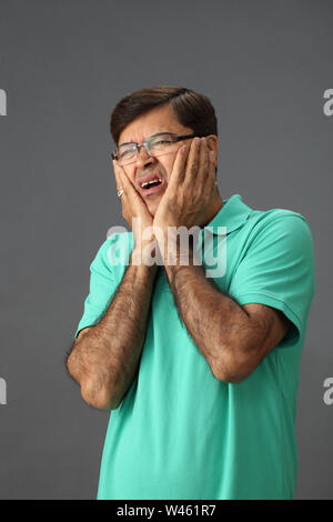 Man suffering from toothache Stock Photo