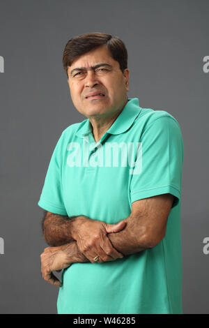 Man suffering from hand pain Stock Photo