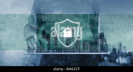 Online data security system and AI. artificial intelligence technology. a man using digital tablet with lock shielding lock icon Stock Photo