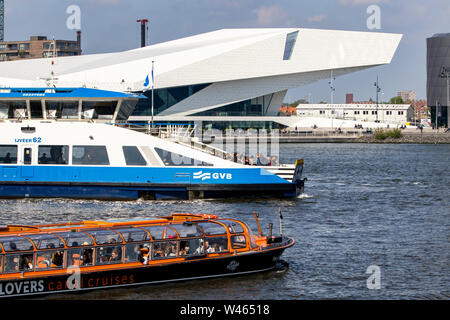 Amsterdam, Netherlands, passenger and bicycle ferry across the river Ij, connects different parts of the city, Eye Movie Museum, Stock Photo