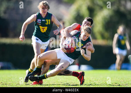 Box Hill City Oval, Melbourne, Australia. 20th July 2019. Australian Rules Football Under 18s Championships, Gippsland Power versus Tasmania Devils; Zac Adams of the Tasmanian Devils is tackled with the ball Credit: Action Plus Sports Images/Alamy Live News Stock Photo