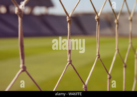 The net in Artificial turf at sunset. Stock Photo
